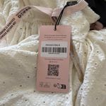 Oh Polly  Dress Haddie Broderie Anglaise Halterneck Mini Dress in White Photo 5