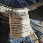 American Eagle  Outfitters Distressed Flare Jeans in Blue Photo 5