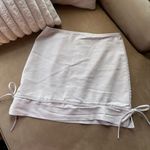 Chic White Mini Skirt with Bow Accents Size M Photo 0