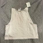 Divided Cream Sleeveless Top Photo 1