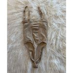 SKIMS Seamless Sculpt Strapless Thong Bodysuit Clay
Size Small Photo 5