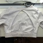 Amazon  white long sleeve open back workout top Photo 1