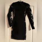 Alyce Paris  x-small elegant black party dress. Long sleeves with open back. Photo 2