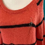 Love by Design  orange sweater in size small Photo 1