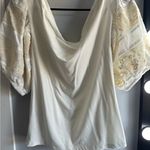 Free People Cream Blouse with Ruffled Asymmetrical Design and Short Sleeves Photo 0