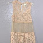 Esley nude crochet lace sleeveless peplum blouse Photo 0