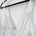 Reformation | Vivien Peplum Cotton Blend V-Neck Top in White Photo 8