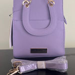 Trina Turk double handle tote in lilac with a removable crossbody strap Photo 0