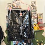 Forever 21  black vinyl or faux leather mini skirt with a front zipper closure Photo 2