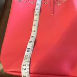 Macy's Vibrant Red Tote Bag with Black Intricate Cut-Out Design Photo 2