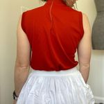 Vintage 70s burnt orange mock turtleneck knit tank. Size M Photo 2