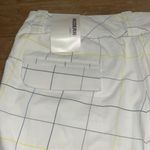 Nike Woman’s  Dri-Fit Golf Bermuda Shorts White w/blue & yellow stripes Size 6 Photo 5