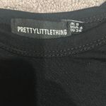 Pretty Little Thing Black baby tee- - US 4 Photo 2