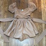 Chic Mable Tan Jumpsuit with crisscross open midriff with tie back. Size M Photo 2