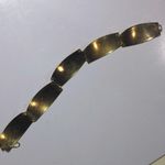 Vintage Peruvian Gold Toned Bracelet Storytelling Engravings Hook Closure Photo 1