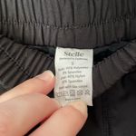 Stelle Athletic Shorts with Built in Spandex lining with pockets Black Photo 4