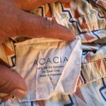 Acacia Swimwear Elevate your style with this chic striped top Photo 1