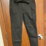 American Eagle Highest rise black Jegging size 6 with bow belt Photo 0