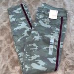 SO camouflage favorite skinny jeggings pants with maroon colored velour Strip Photo 1