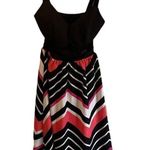 Elegant Black & Coral Chevron Print Dress with Fitted Bodice and Flowy B2 Skirt Pink Photo 0