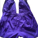 REI purple windbreaker pants that unzip at bottom measurements in pictures Size undefined Photo 0