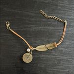 Gold Feather Charm Bracelet Photo 2