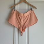 SKIMS  French Terry Short Short in Cantaloupe, Size Medium Photo 7