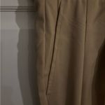 Timeless form tan pants.‎ Buckles on waist. Size 28 Photo 3