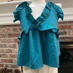 Romeo + Juliet Couture  turquoise ruffled crop top with lace up back / M … Photo 6