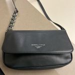 Kendall + Kylie Black Crossbody Bag with Flap Closure and Adjustable Strap Photo 0