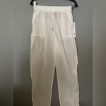Alo Yoga NWT  Cloud Nine Pants white Size XS With Pockets Photo 2