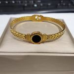 Stainless steel Gold Plated Roman Numeral Love Bangle. Photo 1