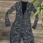 Elegant Black and White Patterned Jumpsuit Size M Photo 3