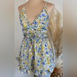 Luxxel  Women’s romper size small 
Full of Bloom Romper flower print Photo 1