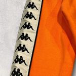Kappa β
Orange Athletic Cropped Pullover Sweatshirt w/ Logo Tape Sleeves β
Photo 4