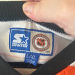 Starter Black and White Hockey Jersey with Orange Accents Photo 2