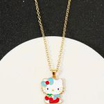 Hello Kitty Adorable  with Cherries and a Cute Baby Blue/Red Bow Charm Necklace Photo 1