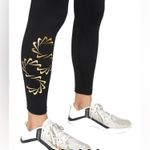 Nike  Therma-Fit One Women’s Sz S Black Mid-Rise Graphic Training Leggings Photo 2