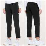 Lululemon On the Fly Cropped Woven Pant Black Commute Travel Casual Move Size 10 Photo 1