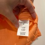 Francesca's Francesca’s orange button up top Photo 3