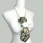 “Dainty Dapper” print design sage color necktie Necklace & floral attachment White Photo 3