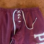 PINK - Victoria's Secret Women’s Burgundy Sweatpants by  Photo 1