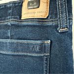 American Eagle AE Next Level Stretch Low Rise Kick Bootcut Jean Patch Pockets Size 12 Short Photo 4