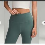 Lululemon  wunder train high rise tight 28”
Sz 4 Medium forest Photo 1