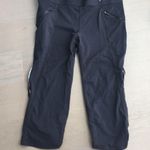 Nike Gap Fit gfast zip pocket Capri in true black Photo 1