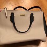 Kate Spade Cream and Black Large Leather Satchel Handbag with Crossbody Strap. Photo 8