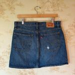 Levi's Levi’s denim mini skirt in blue medium wash jean distressed size 30 Photo 5