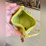 Coach  Zip Neon Yellow wristlet in signature canvas Photo 4