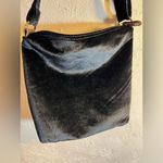 Crossbody NWOT, faux velvet black bag,
Adjust. strap, zip top, side zip pocket Photo 4