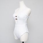 Becca . Modern Edge Cutout Ribbed One-Piece Swimsuit. Photo 9